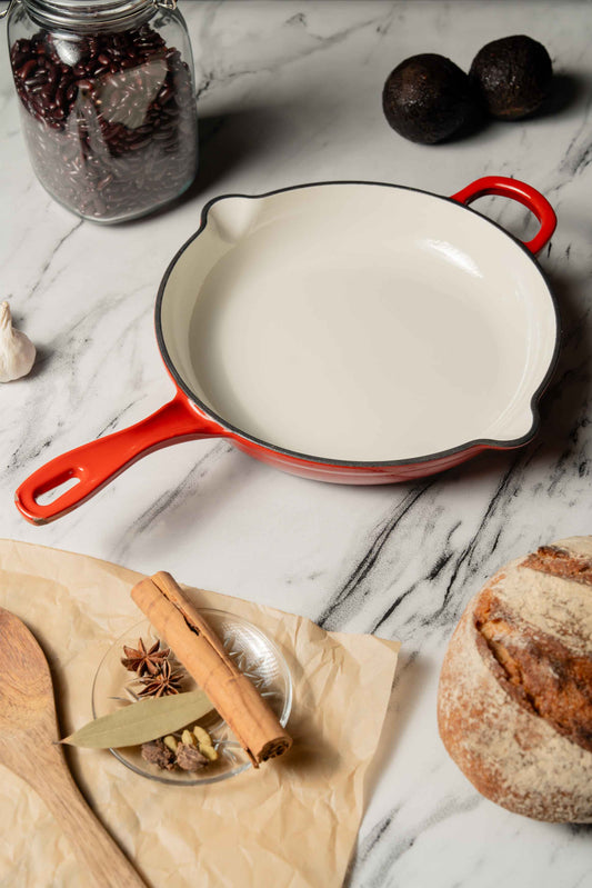Elvira Enamel Coated Cast Iron Frying Pan on the table.